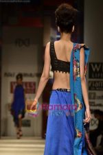 Model walks the ramp for Niki Mahajan show on Wills Lifestyle India Fashion Week 2011-Day 4 in Delhi on 9th April 2011 (140).JPG